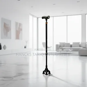Quad-Base Adjustable Walking Cane With an Integrated LED Flashlight.
