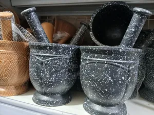 Spice Grinding Mortar and Pestle Sets Made of Speckled Black Granite.