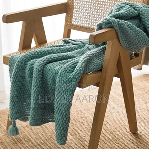 Textured Knitted Throw Blanket With Tassels