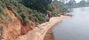 Two Acres Measuring Direct From Lake on Quicksale in Nkumba Kasanyi