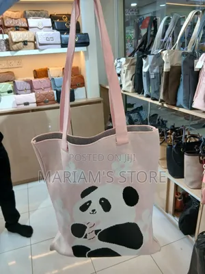 Tote Bag With a Prominent Knitted Panda Design With Soft Pastel