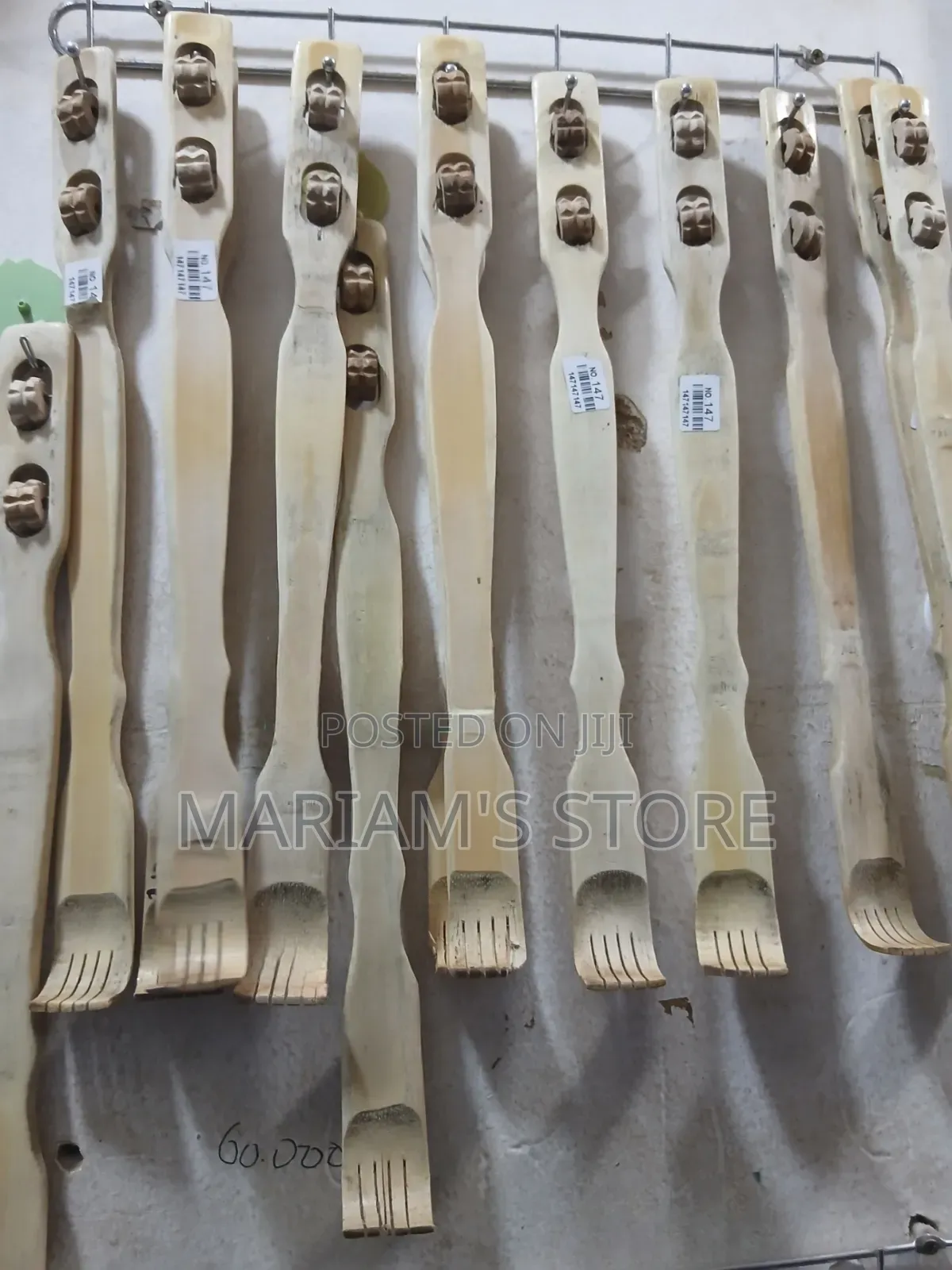Bamboo Back Scratchers With Integrated Roller Massagers.