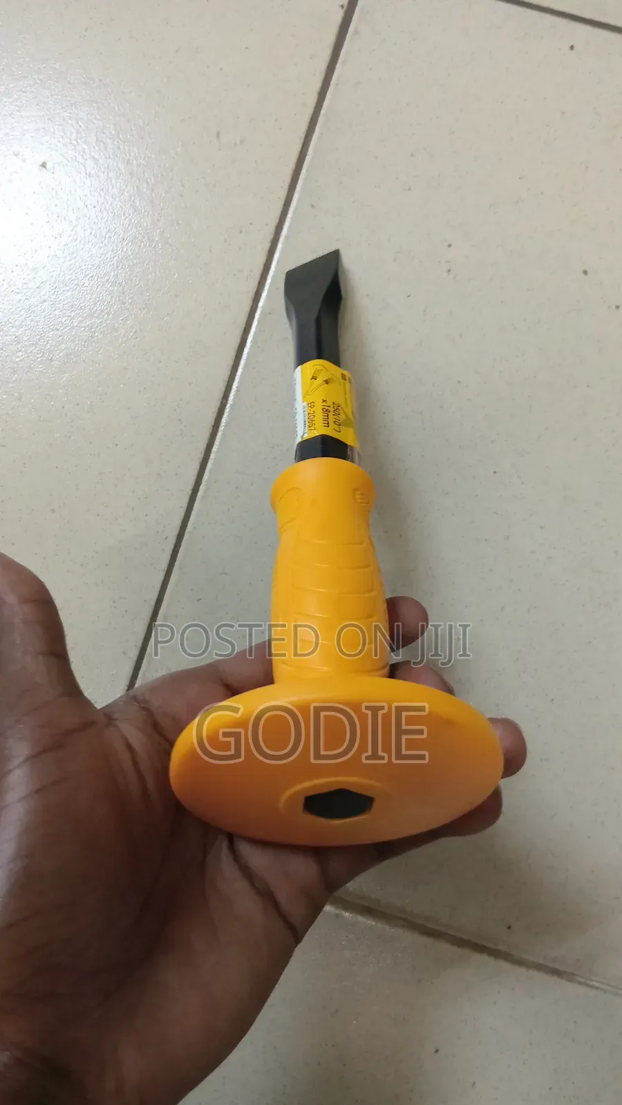 Heavy-Duty Chisel Designed for Cutting or Shaping Metal and Concrete.