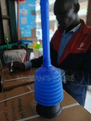 Toilet Plunger With a Black Rubber Suction Cup Base.