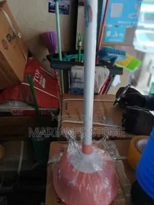 Toilet Plunger With a Black Rubber Suction Cup Base.
