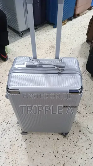 Medium Sleek Silver Suitcase
