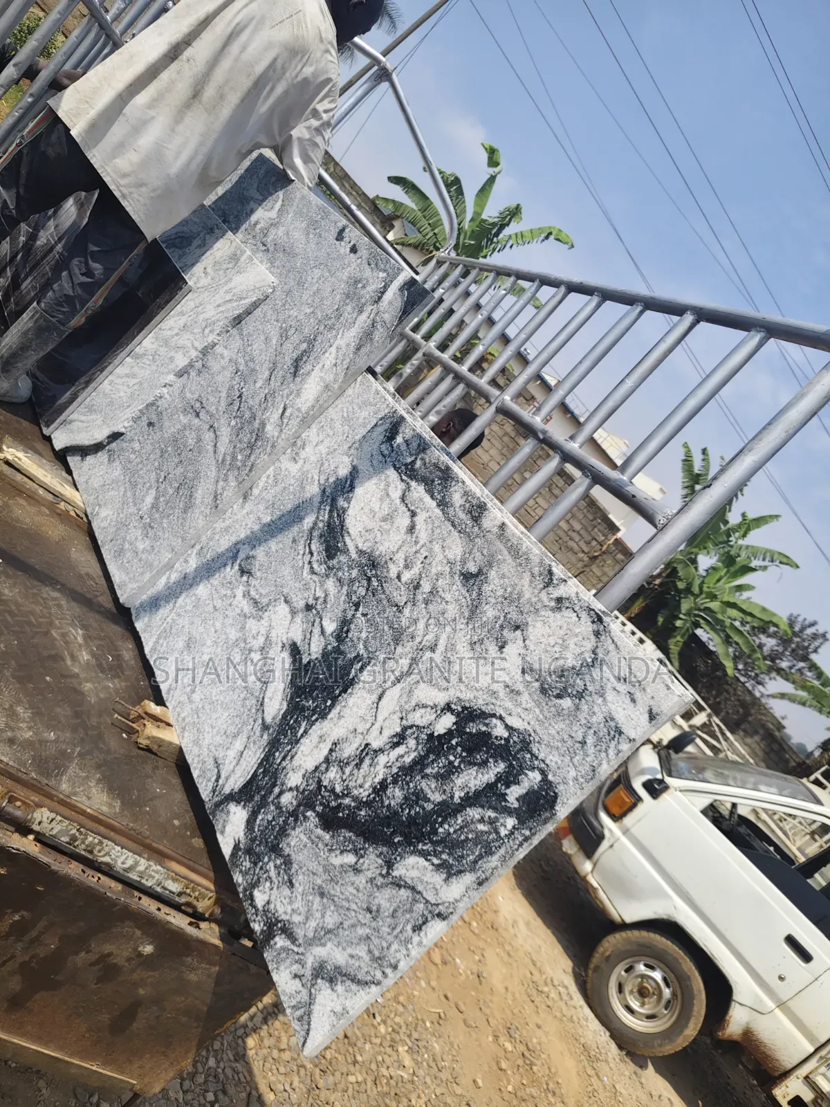 White Granite Slabs – Black Wave Pattern