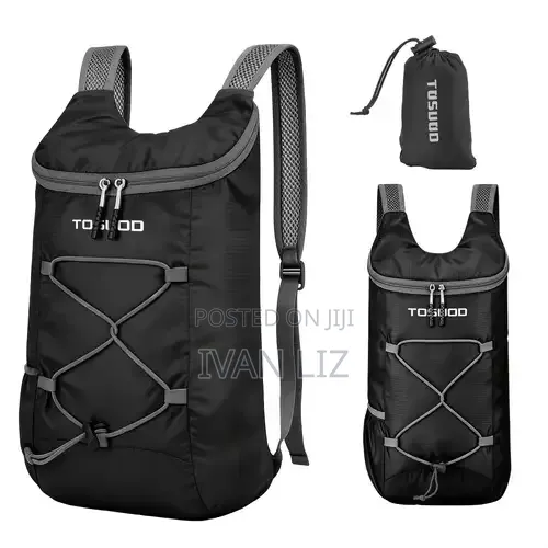 TUSUUD Black Nylon Foldable Backpack Features a Front Elastic Bungee