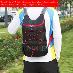 TUSUUD Black Nylon Foldable Backpack Features a Front Elastic Bungee