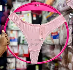 A Solid Red, Seamless G-String Thong Bikini Bottom.