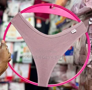 A Solid Red, Seamless G-String Thong Bikini Bottom.