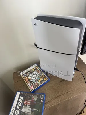 Ps5 Slim Disc With 1 Pad, 2 Games on CDs. Fc26 and GTA 6. UK USED