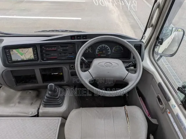 Toyota Coaster 2010 Beige