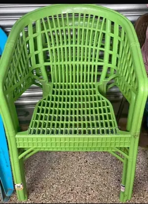 Plastic Armchair Featuring a Prominent Lattice-Style Design.