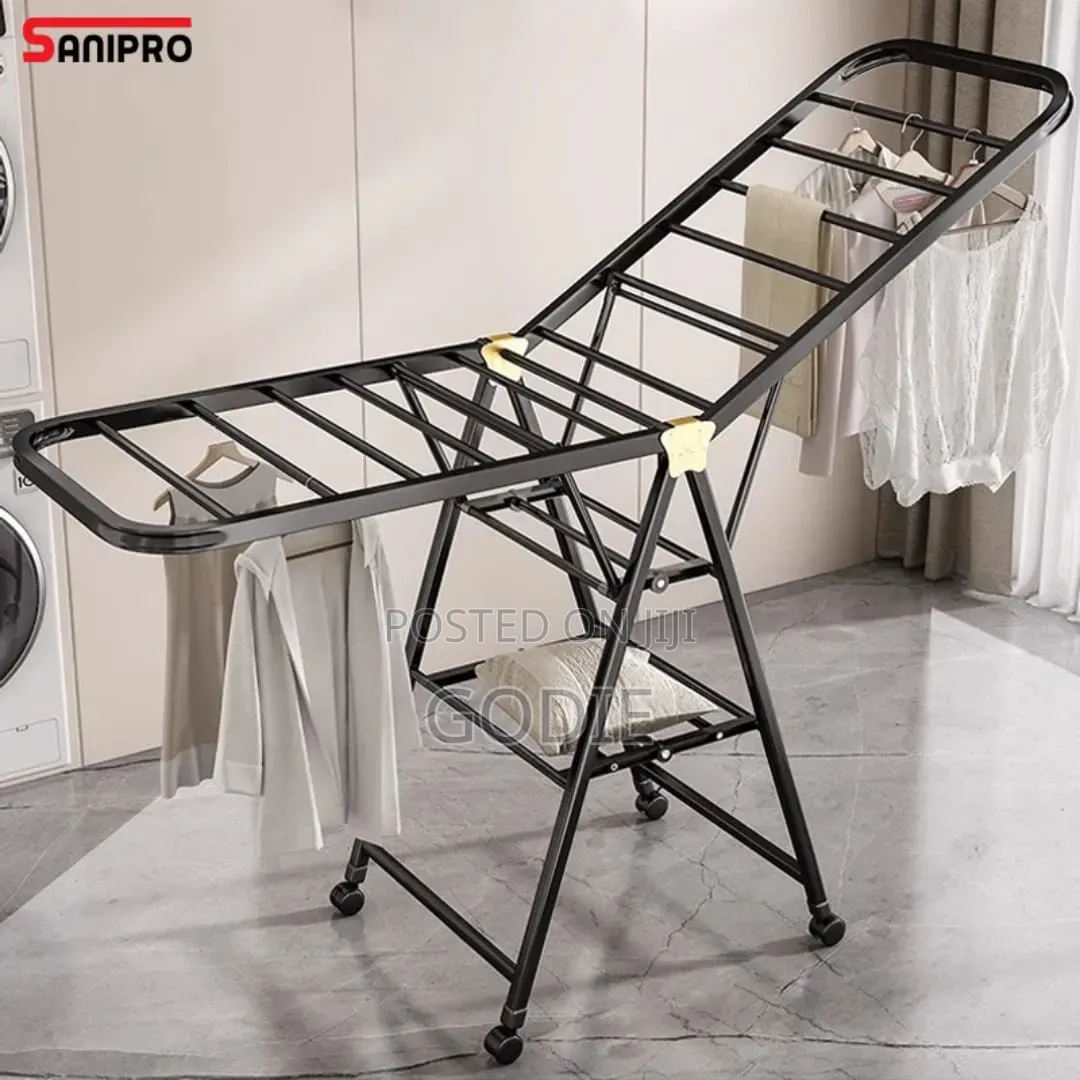 Foldable 3-Tier Stainless Steel Clothes Drying Rack With Wheels.
