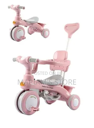 Pink Stroller Tricycle Features a Removable Sun Canopy .