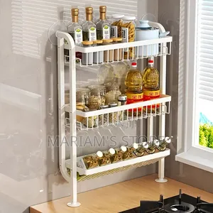 3-Tier White Metal Hanging Rack Utilizes Suction Cups for Wall Hanging