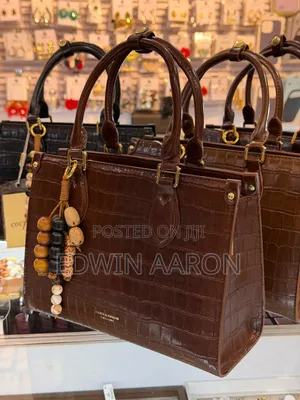 Cocy Deron Crocodile - Print Faux Material Handbags
