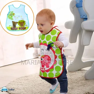 Sleeveless, Waterproof Baby Apron Bib With a Rocket Graphic