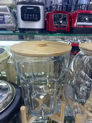 Glass Beverage Dispenser With Wooden Lid and Stand.