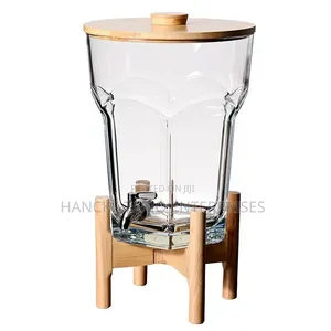 Glass Beverage Dispenser With Wooden Lid and Stand.