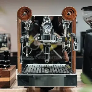 Countertop Espresso Machine With Dual Steam Wands and Wood Accents.