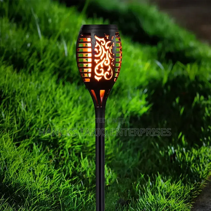 Solar-Powered Flickering Flame Garden Torch Lights.