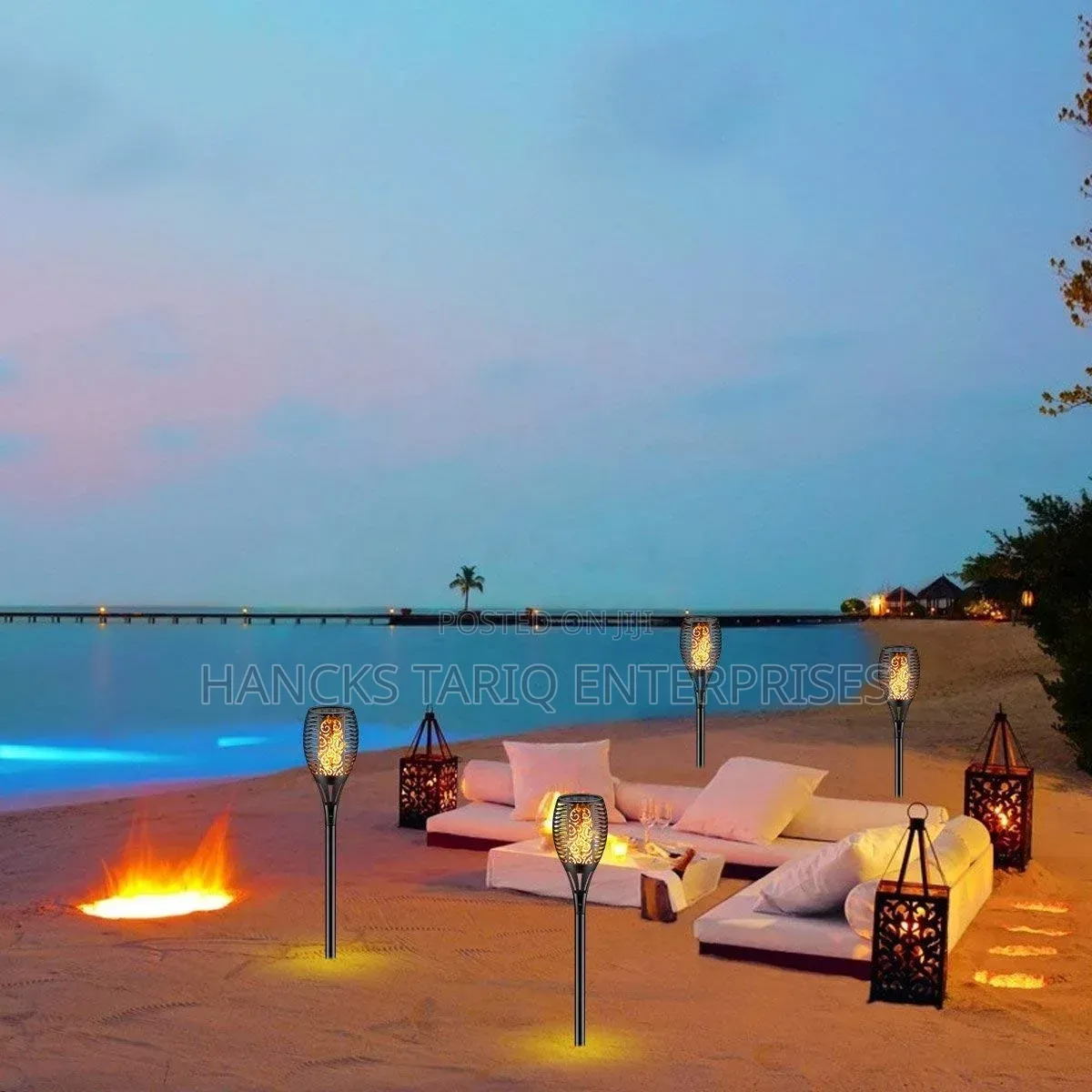 Solar-Powered Flickering Flame Garden Torch Lights.