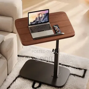 C-Shaped Side Table Features a Wood-Grain Top and Adjustable Height .