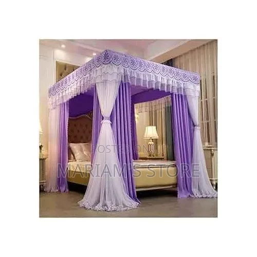 4-Stand Bed Canopy ,A Decorative Lace Top and Flowing White Curtains.