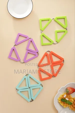 Expandable Silicone Trivet Mats Feature a Stainless Steel Frame.