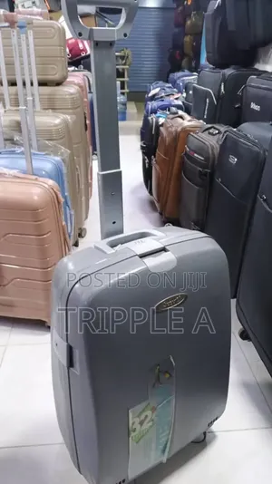 A Grey Hard-Shell Rolling Cabin Suitcase