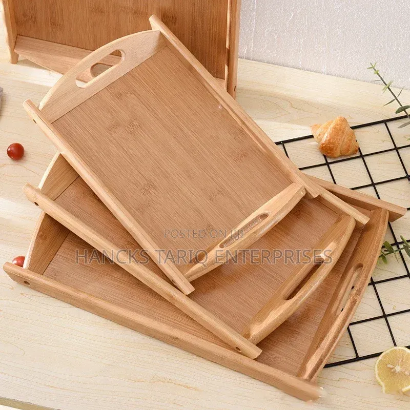 Set of Nested Wooden Serving Trays.