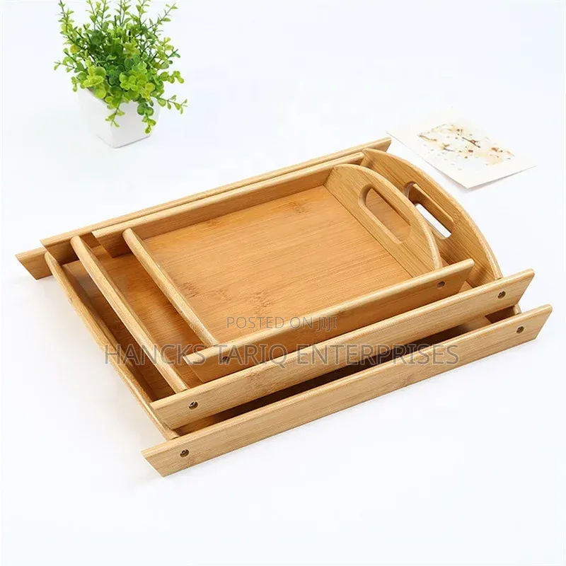 Set of Nested Wooden Serving Trays.