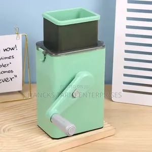 Multi-Function Rotary Vegetable Cutter / Grater .