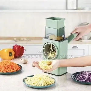Multi-Function Rotary Vegetable Cutter / Grater .