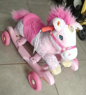 UK Used Pink Disney Princess Plush Rocking Pony for Children.