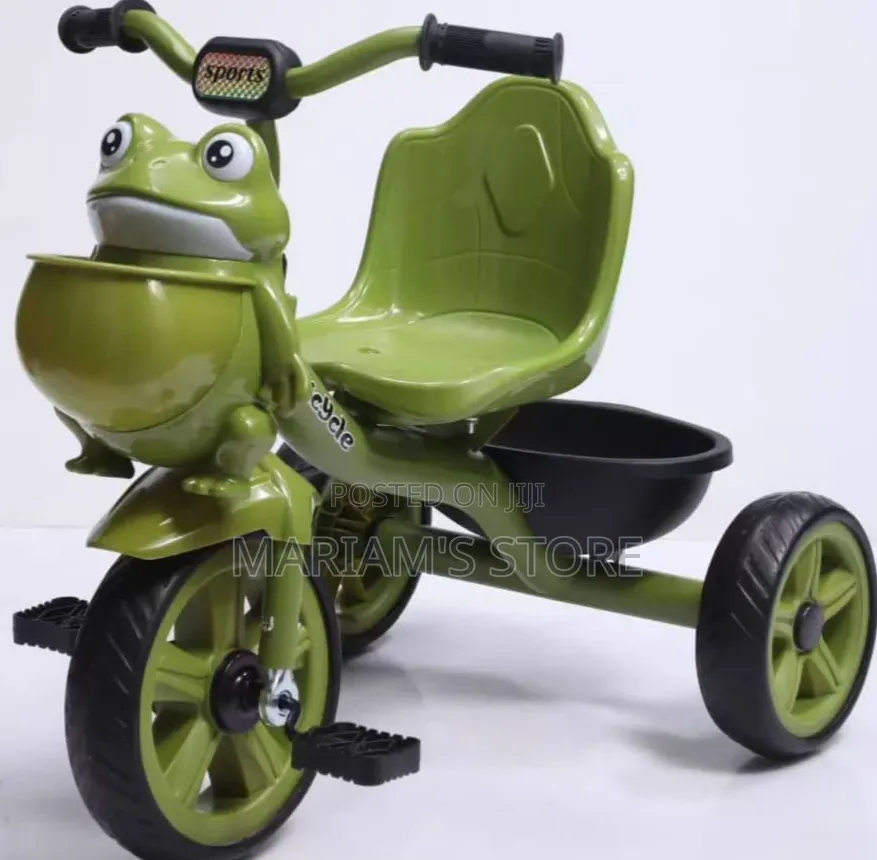 Tricycle in a Green Plastic Frog-Shaped Front Basket