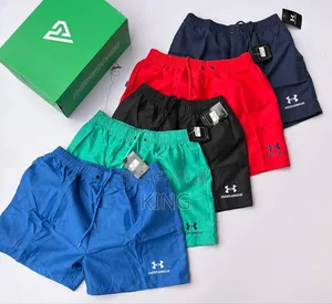 Lacoste, Louis Vuitton, and Hugo Boss Swim Shorts