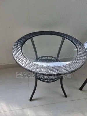 Round Glass Outdoor Table With Black Rattan Edging