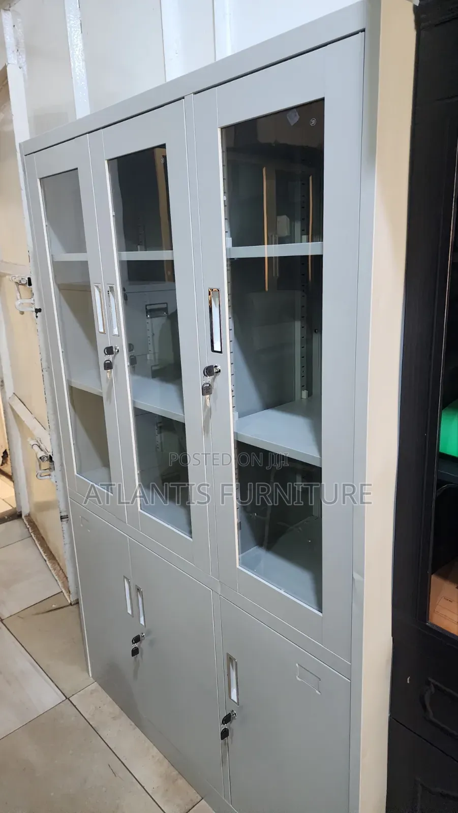 Three Doors With Glasses Cabinets