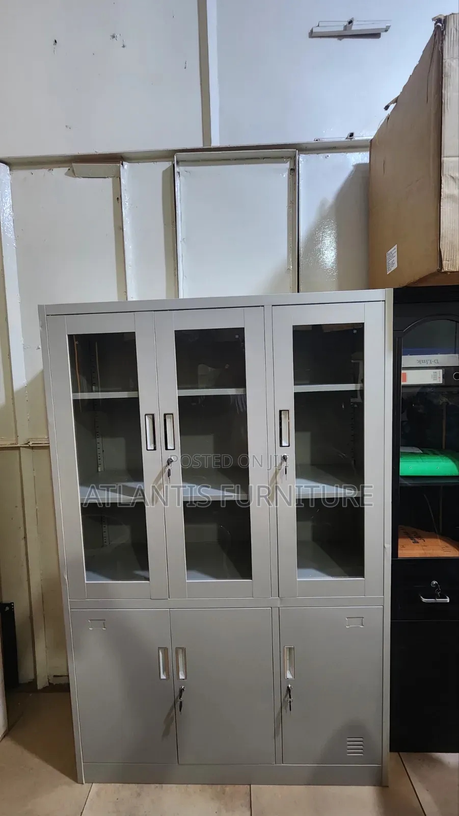 Three Doors With Glasses Cabinets