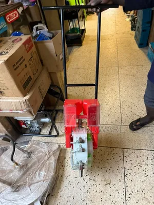 Hand-Push Seeder and Fertilizer Applicator