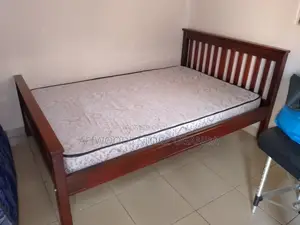4 by 6 Strong Bed and Mattress for Sale in Good Condition at Lubowa