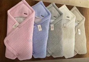 Baby Swaddle Blankets With a Buttoned Design and Cozy Velsoft Lining.
