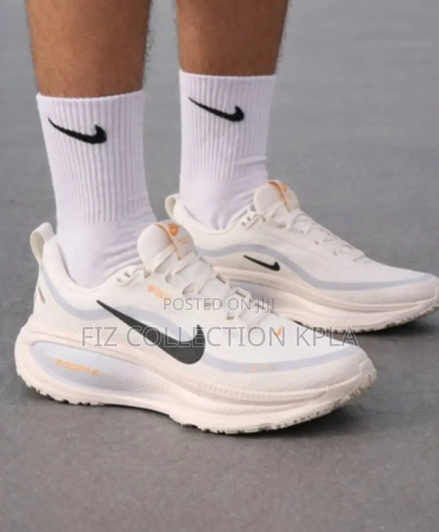1. Nike Vomero 18 White ZoomX Running Shoes
