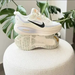 1. Nike Vomero 18 White ZoomX Running Shoes