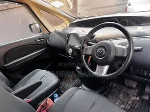Mazda Biante 2009 Burgundy