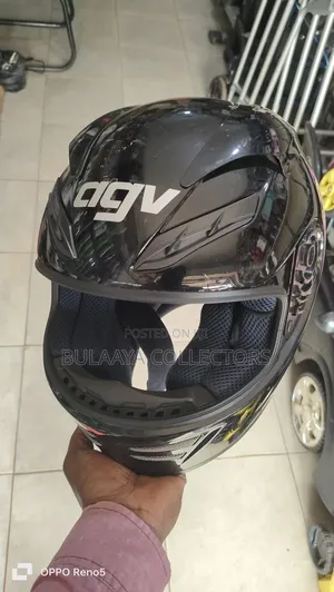 UK Used AGV Motorcycle Helmet in Glossy Black.