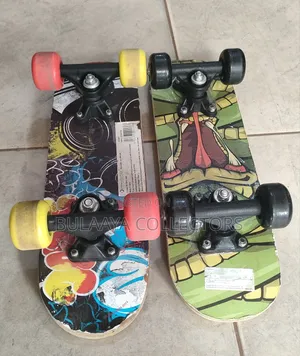 UK Used Small, Printed Wooden Skateboards Designed for Children.